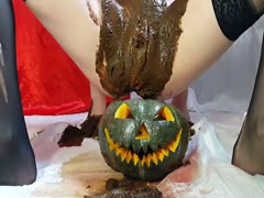 A pumpkin's feces coated the shaved pussy.